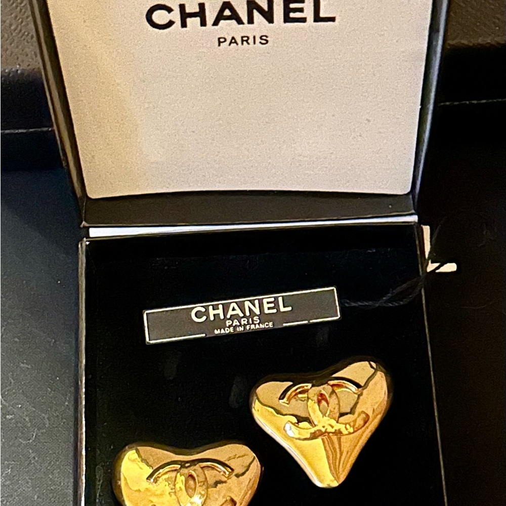 Vintage CHANEL clip on earrings in original box.